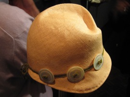 Straw button hat by Linda Ashton.